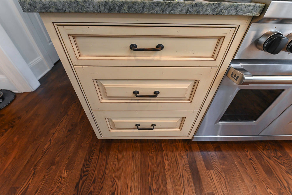 Woodcraft Traditional Light Yellow Kitchen with Island & 48" Wolf Range