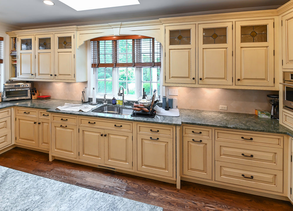 Woodcraft Traditional Light Yellow Kitchen with Island & 48" Wolf Range