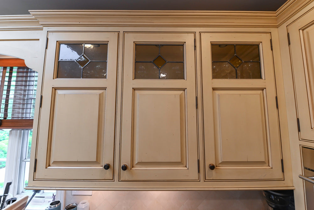 Woodcraft Traditional Light Yellow Kitchen with Island & 48" Wolf Range