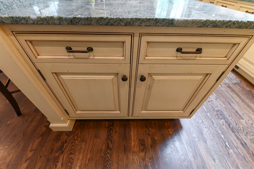 Woodcraft Traditional Light Yellow Kitchen with Island & 48" Wolf Range