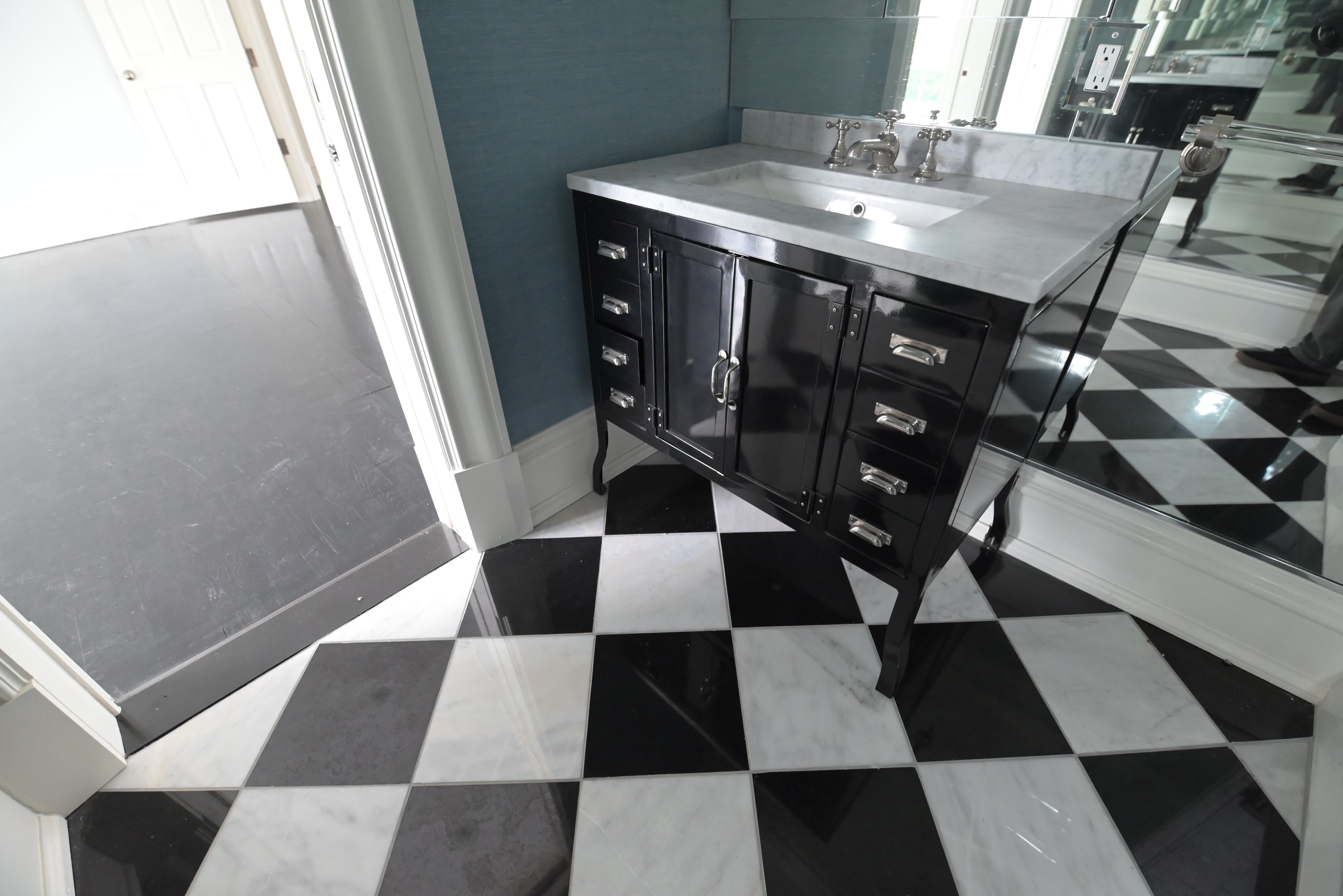 Modern industrial single-sink vanity in black gloss for powder rooms