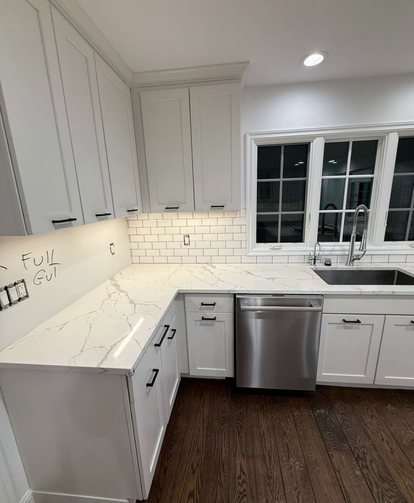 “The Westerly” Transitional White Kitchen with Island, 48" Sub-Zero Refrigerator and Bosch Appliances