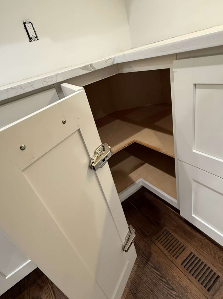 “The Westerly” Transitional White Kitchen with Island, 48" Sub-Zero Refrigerator and Bosch Appliances