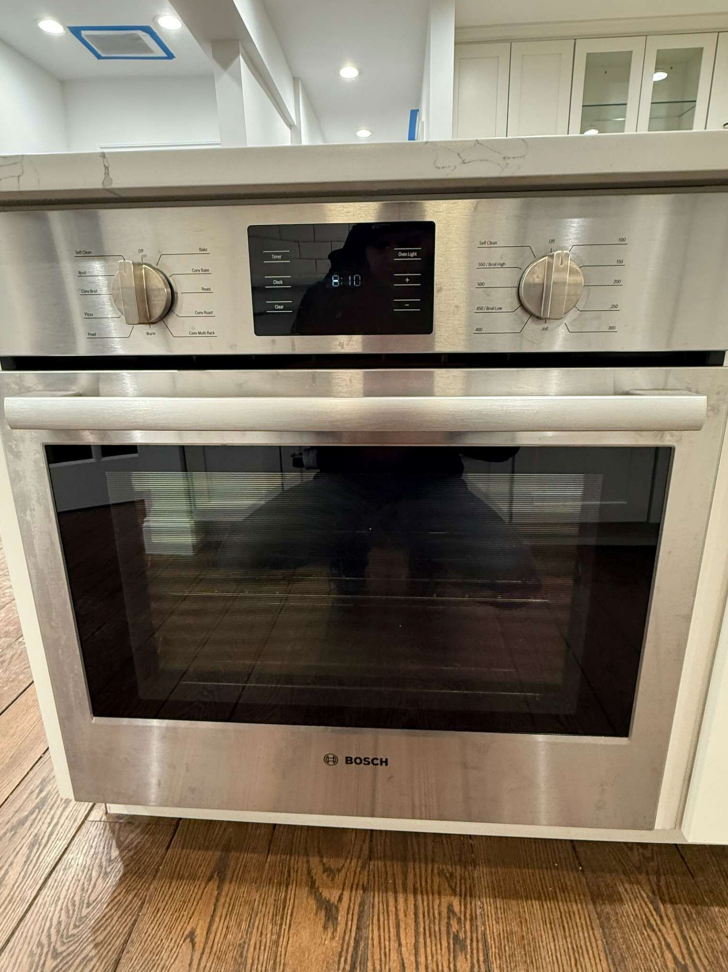 “The Westerly” Transitional White Kitchen with Island, 48" Sub-Zero Refrigerator and Bosch Appliances