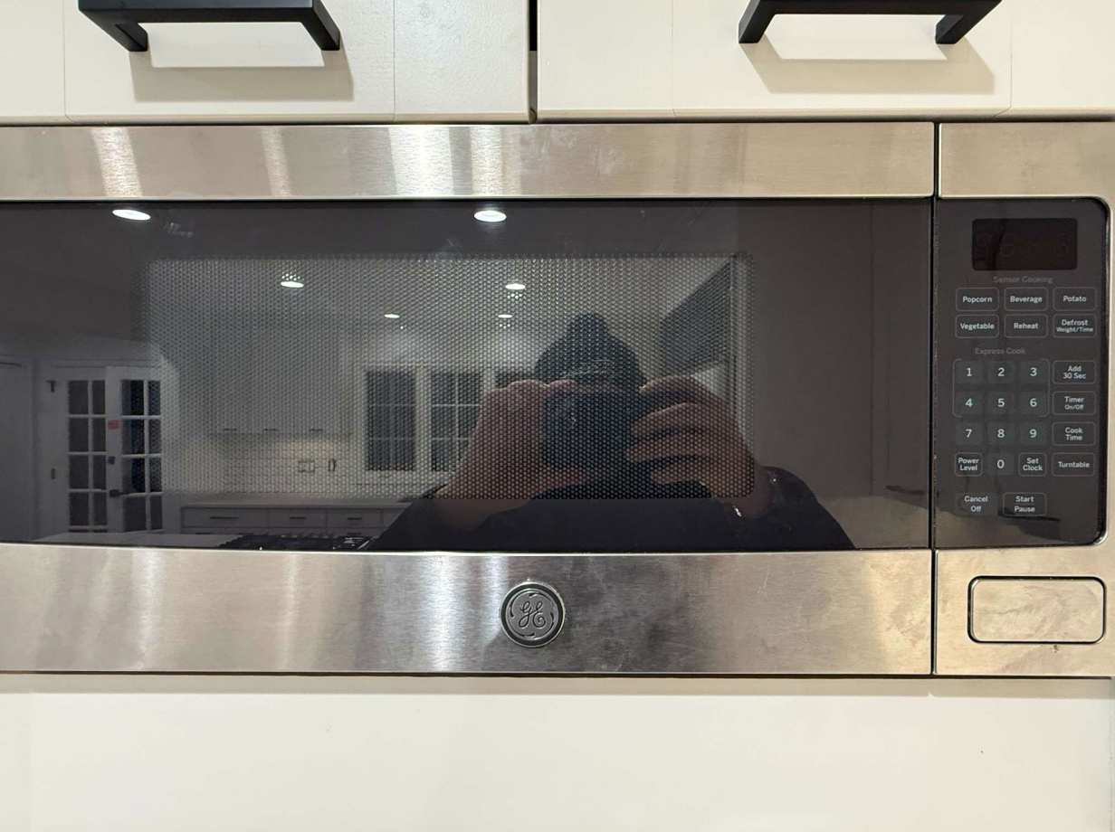 “The Westerly” Transitional White Kitchen with Island, 48" Sub-Zero Refrigerator and Bosch Appliances