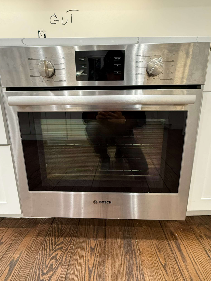 “The Westerly” Transitional White Kitchen with Island, 48" Sub-Zero Refrigerator and Bosch Appliances