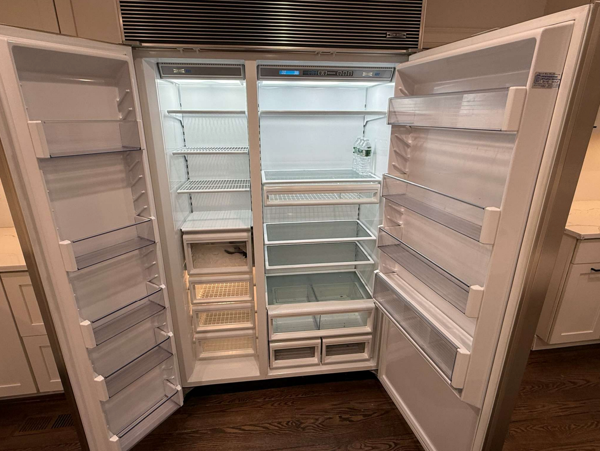 “The Westerly” Transitional White Kitchen with Island, 48" Sub-Zero Refrigerator and Bosch Appliances