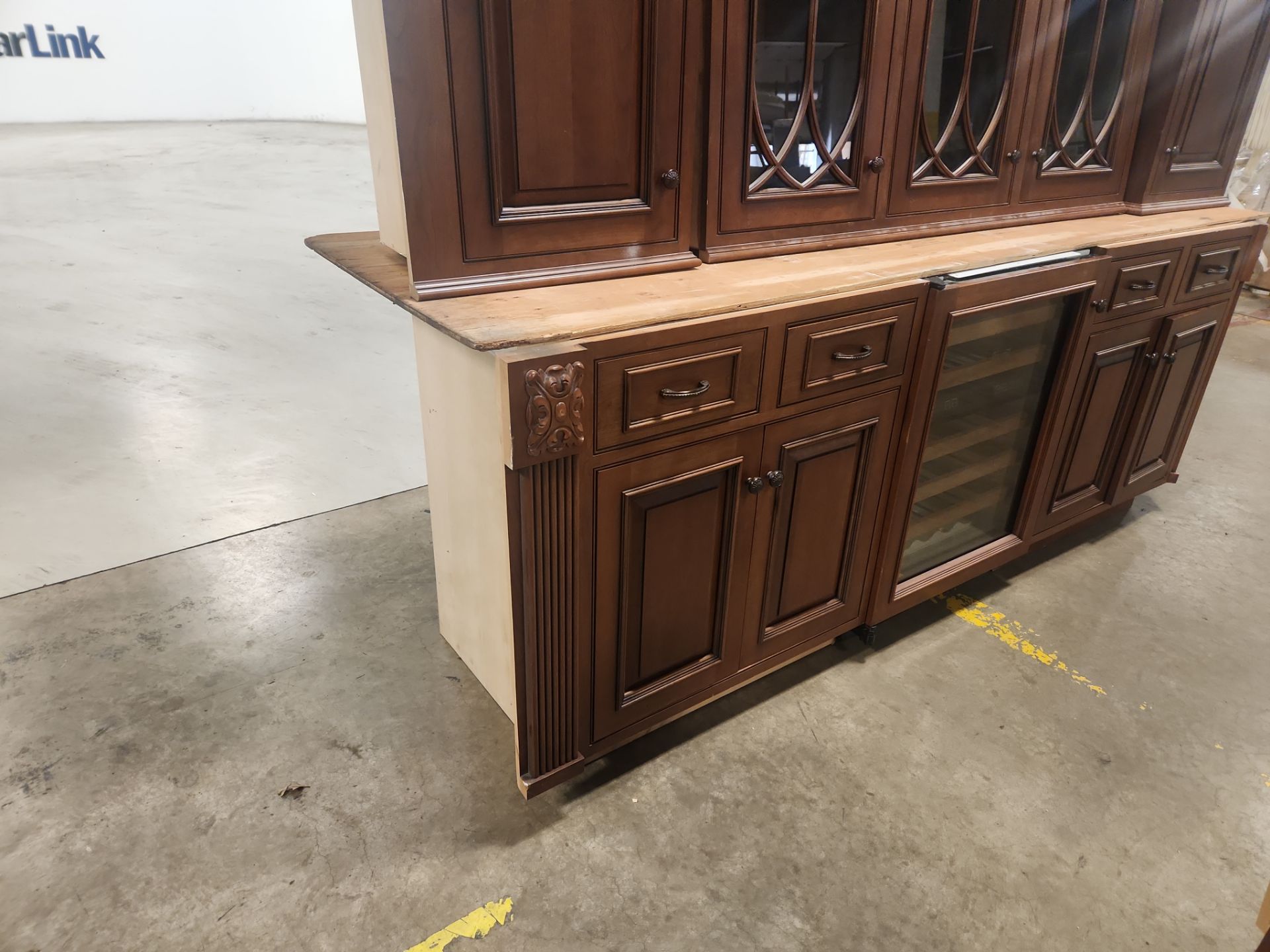 “The Reserve” Custom Traditional Wood Butler's Pantry with Sub-Zero Wine Cooler