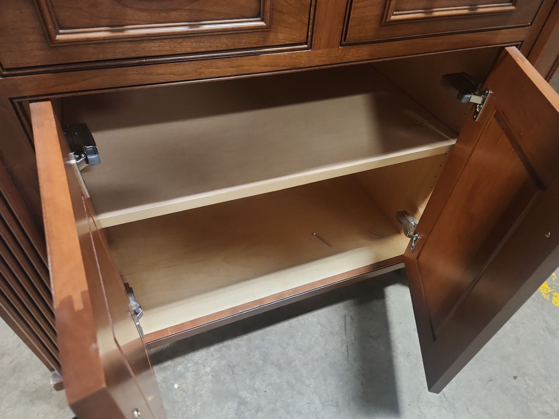 “The Reserve” Custom Traditional Wood Butler's Pantry with Sub-Zero Wine Cooler
