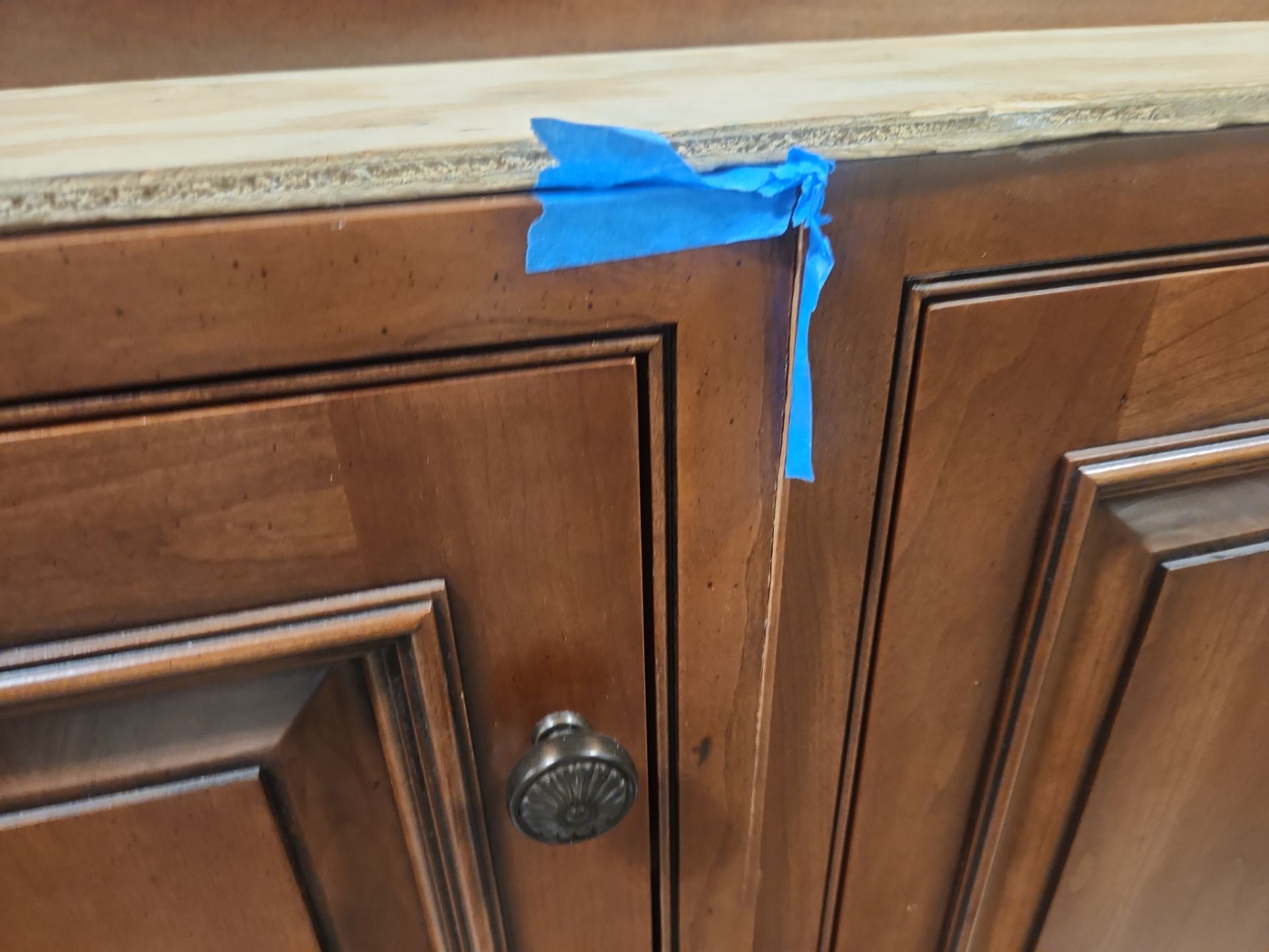 “The Reserve” Custom Traditional Wood Butler's Pantry with Sub-Zero Wine Cooler