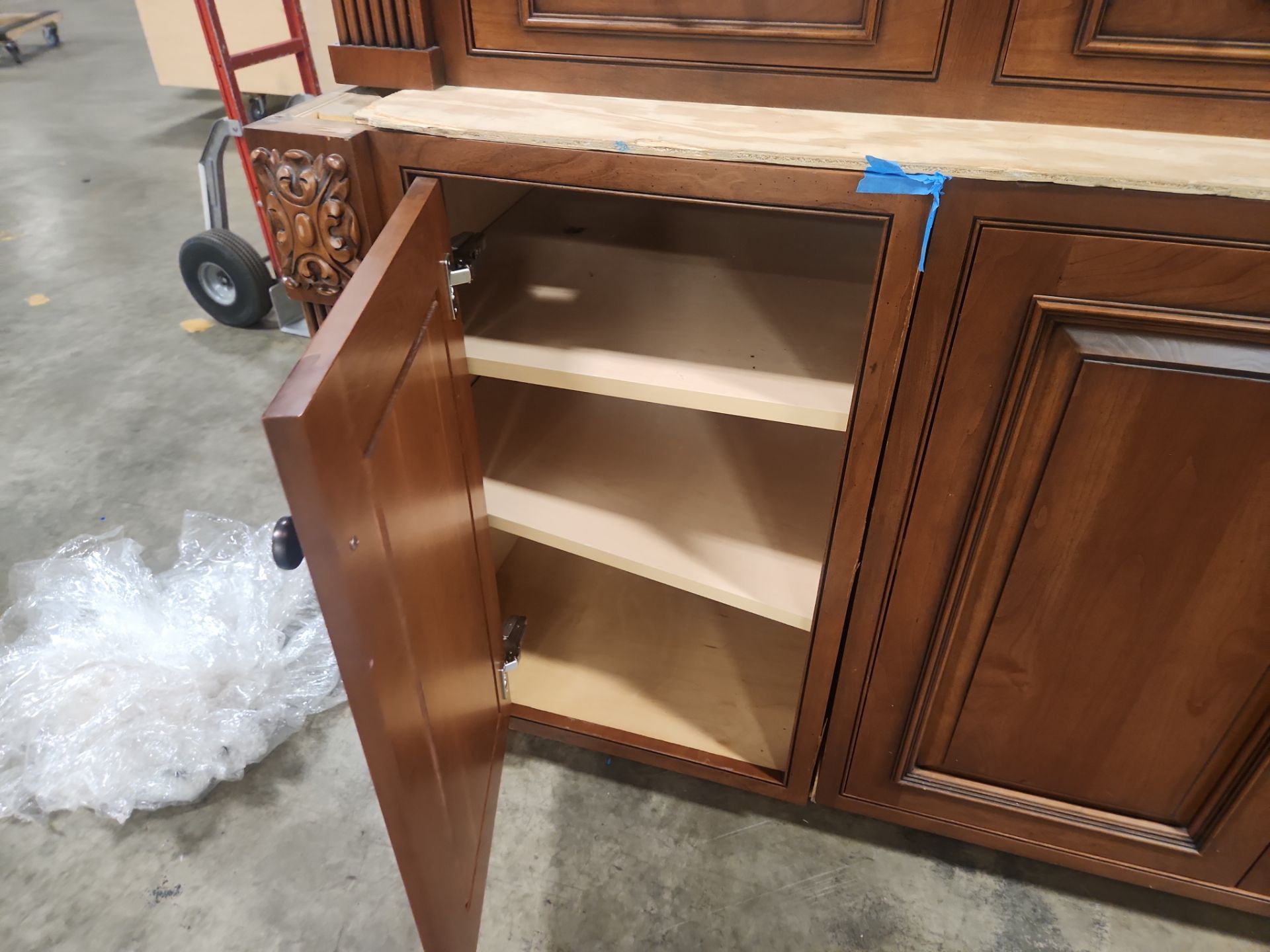 “The Reserve” Custom Traditional Wood Butler's Pantry with Sub-Zero Wine Cooler