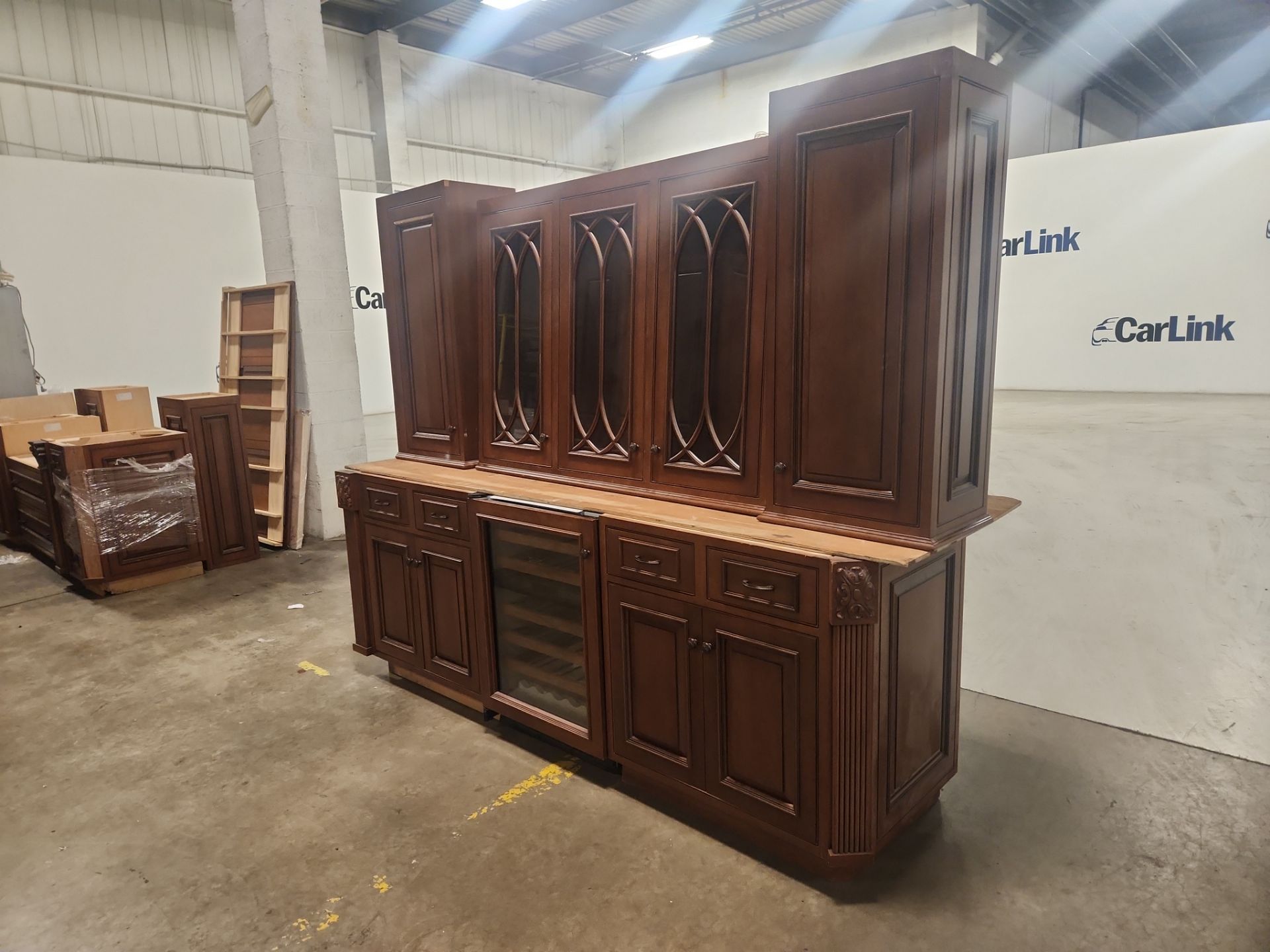 “The Reserve” Custom Traditional Wood Butler's Pantry with Sub-Zero Wine Cooler