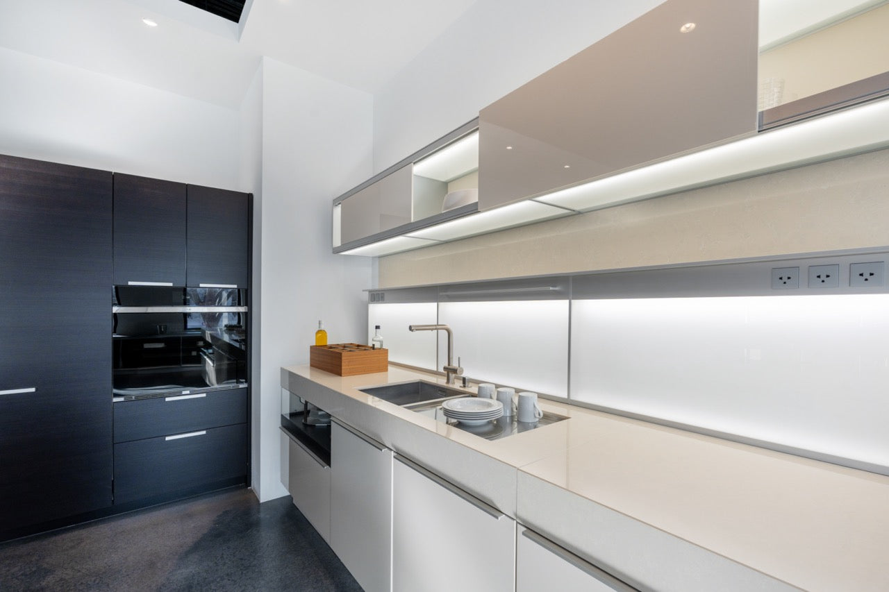 Poggenpohl Plus Modo Modern Black and White Kitchen with Island and Wolf & Sub-Zero Appliances
