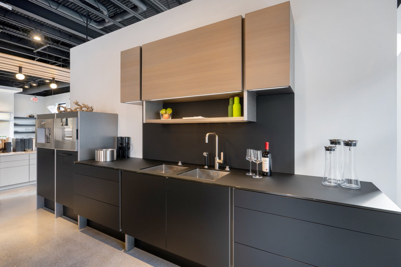 Poggenpohl Porsche Modern Matte Grey Kitchen with Wood Top Seating Area and Gaggenau Appliances