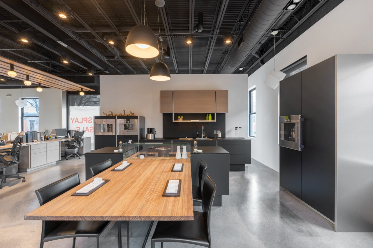 Poggenpohl Porsche Modern Matte Grey Kitchen with Wood Top Seating Area and Gaggenau Appliances