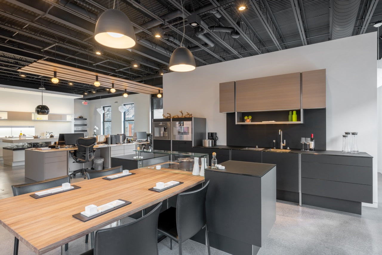 Poggenpohl Porsche Modern Matte Grey Kitchen with Wood Top Seating Area and Gaggenau Appliances