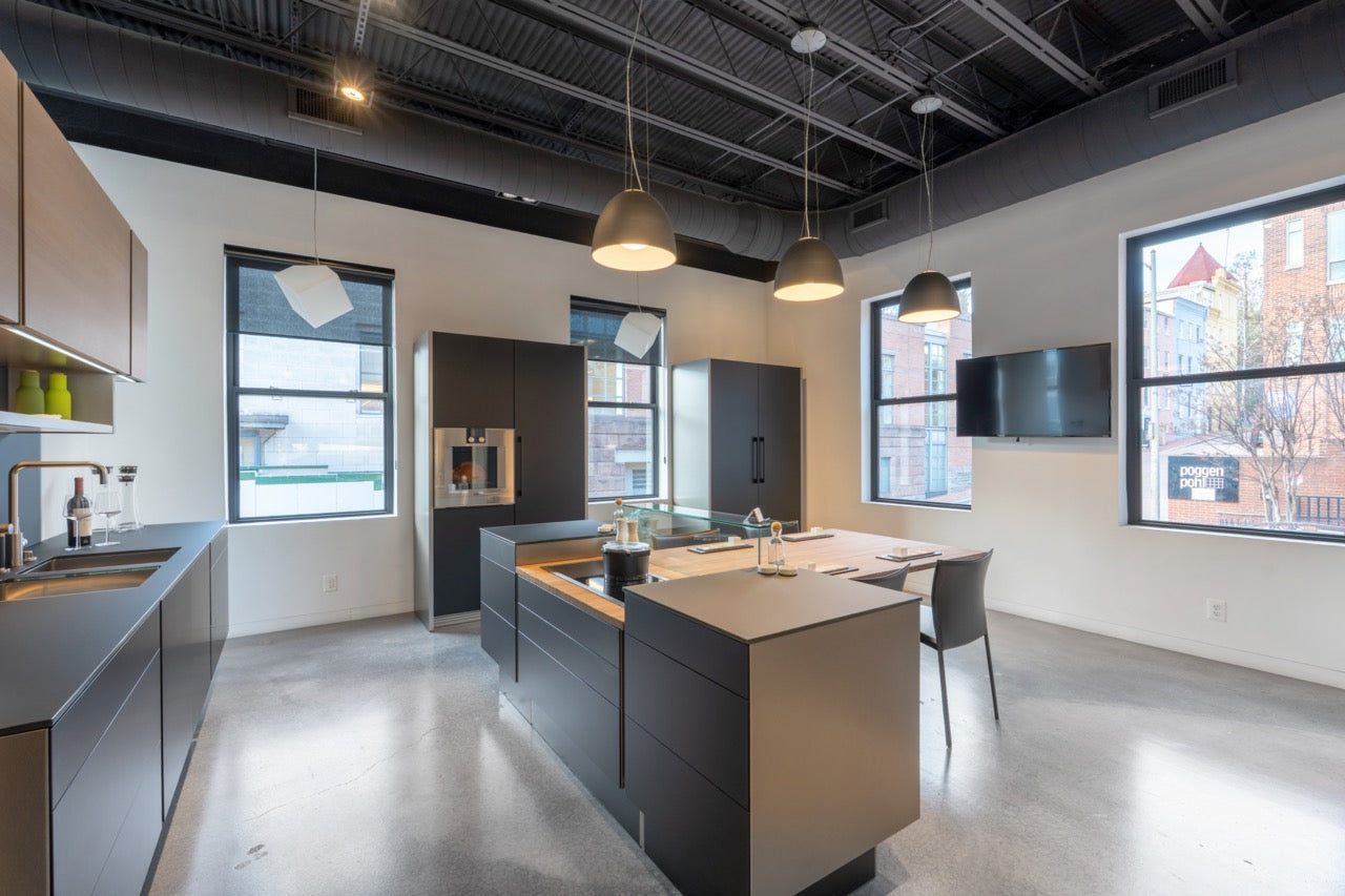 Poggenpohl Porsche Modern Matte Grey Kitchen with Wood Top Seating Area and Gaggenau Appliances