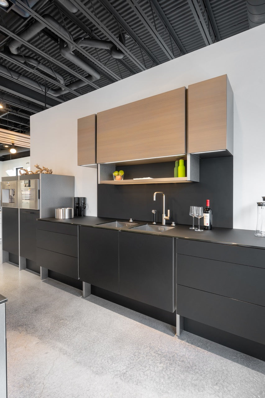 Poggenpohl Porsche Modern Matte Grey Kitchen with Wood Top Seating Area and Gaggenau Appliances