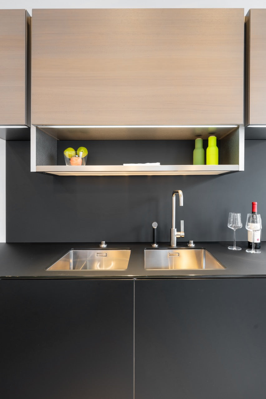 Poggenpohl Porsche Modern Matte Grey Kitchen with Wood Top Seating Area and Gaggenau Appliances