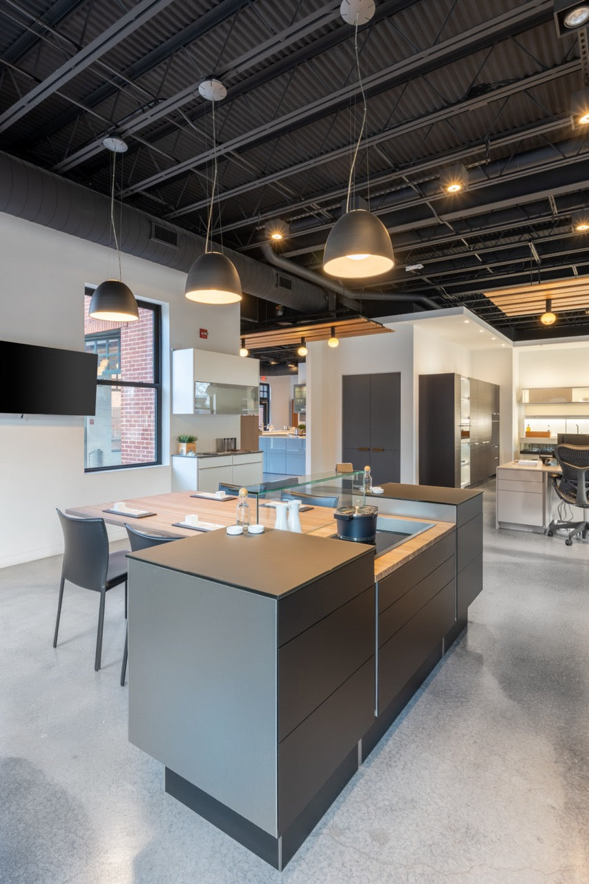 Poggenpohl Porsche Modern Matte Grey Kitchen with Wood Top Seating Area and Gaggenau Appliances
