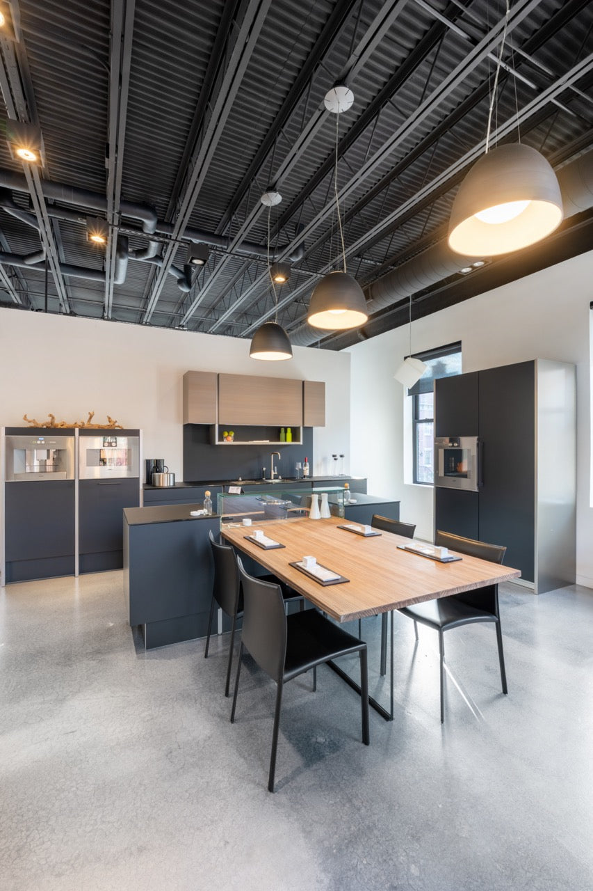 Poggenpohl Porsche Modern Matte Grey Kitchen with Wood Top Seating Area and Gaggenau Appliances