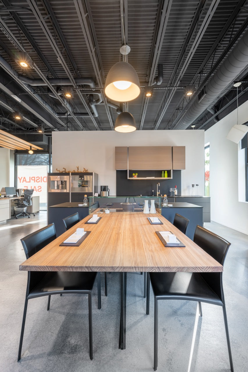 Poggenpohl Porsche Modern Matte Grey Kitchen with Wood Top Seating Area and Gaggenau Appliances