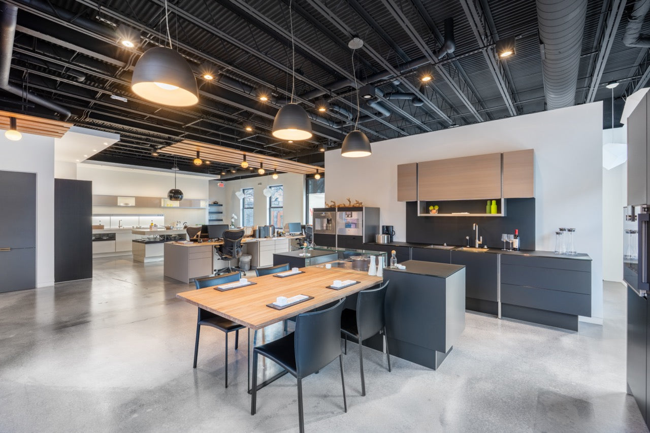 Poggenpohl Porsche Modern Matte Grey Kitchen with Wood Top Seating Area and Gaggenau Appliances