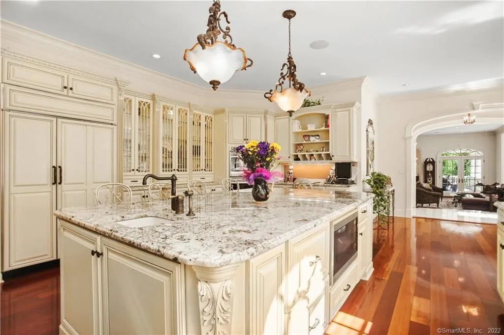 The Ashbourne traditional muted cream complete kitchen cabinetry set with island front view