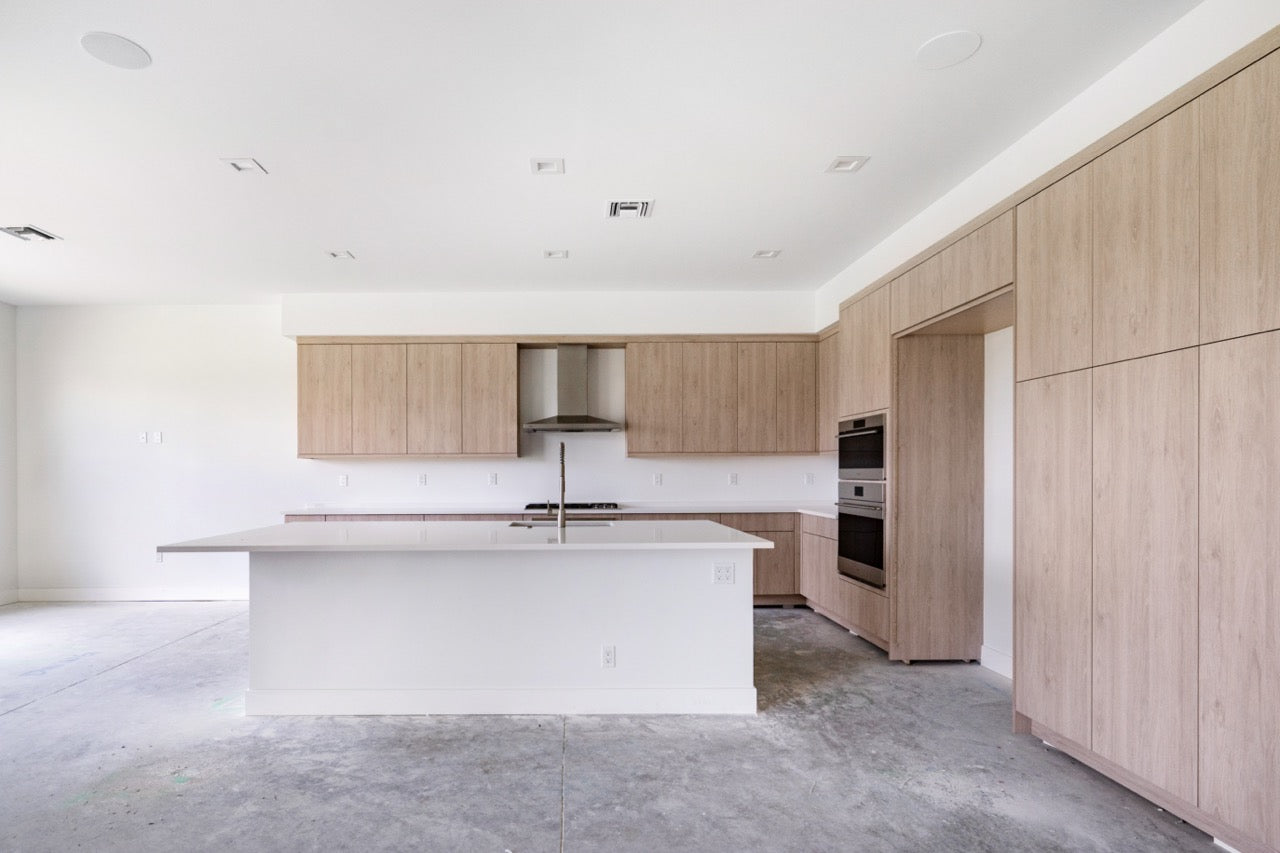 Cabico transitional full kitchen set in premium Sandy Oak with matching island