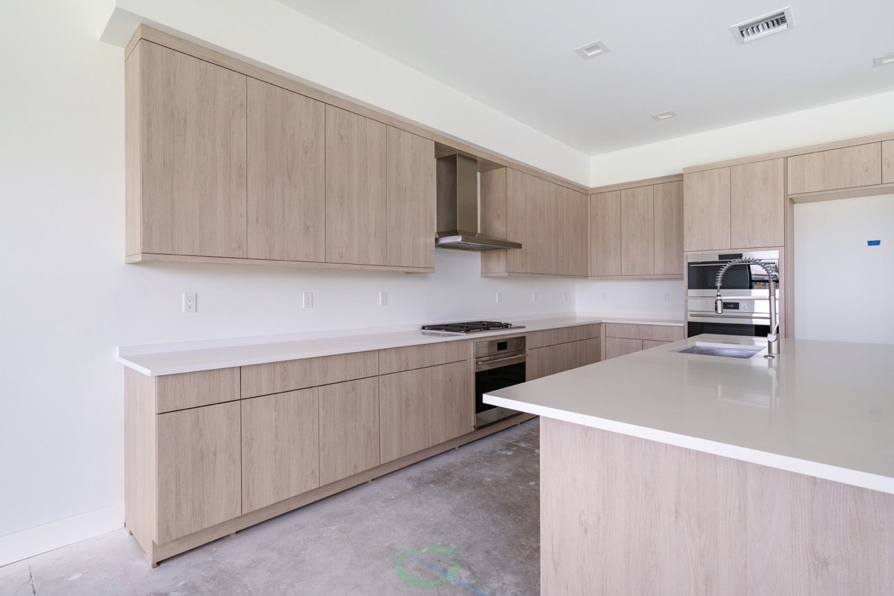 Pre owned custom Cabico kitchen layout showing soft close drawers and side pantry unit