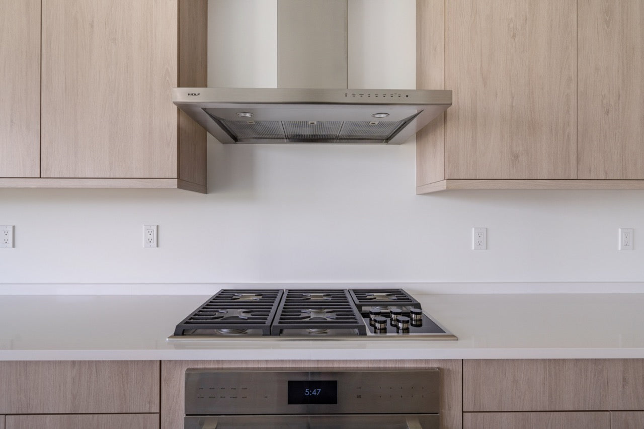 Cabico Sandy Oak Transitional Kitchen with Island & Wolf Appliances