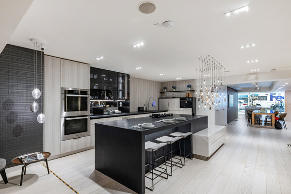 DOCA modern black kitchen cabinets with premium wood veneer panels and center island
