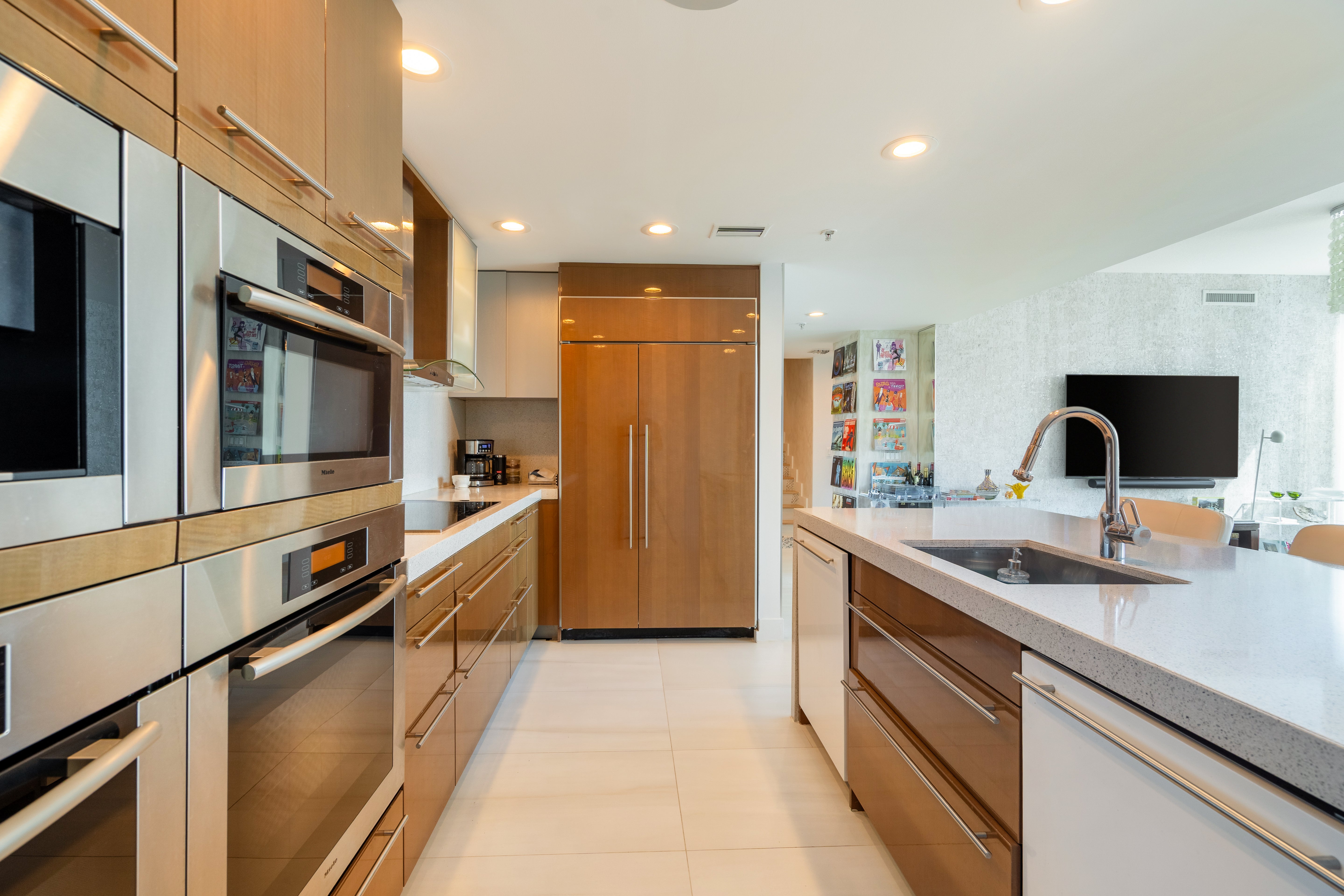 Poggenpohl Modern Glossy Exotic Wood Veneer Kitchen with Island & Miele Appliances