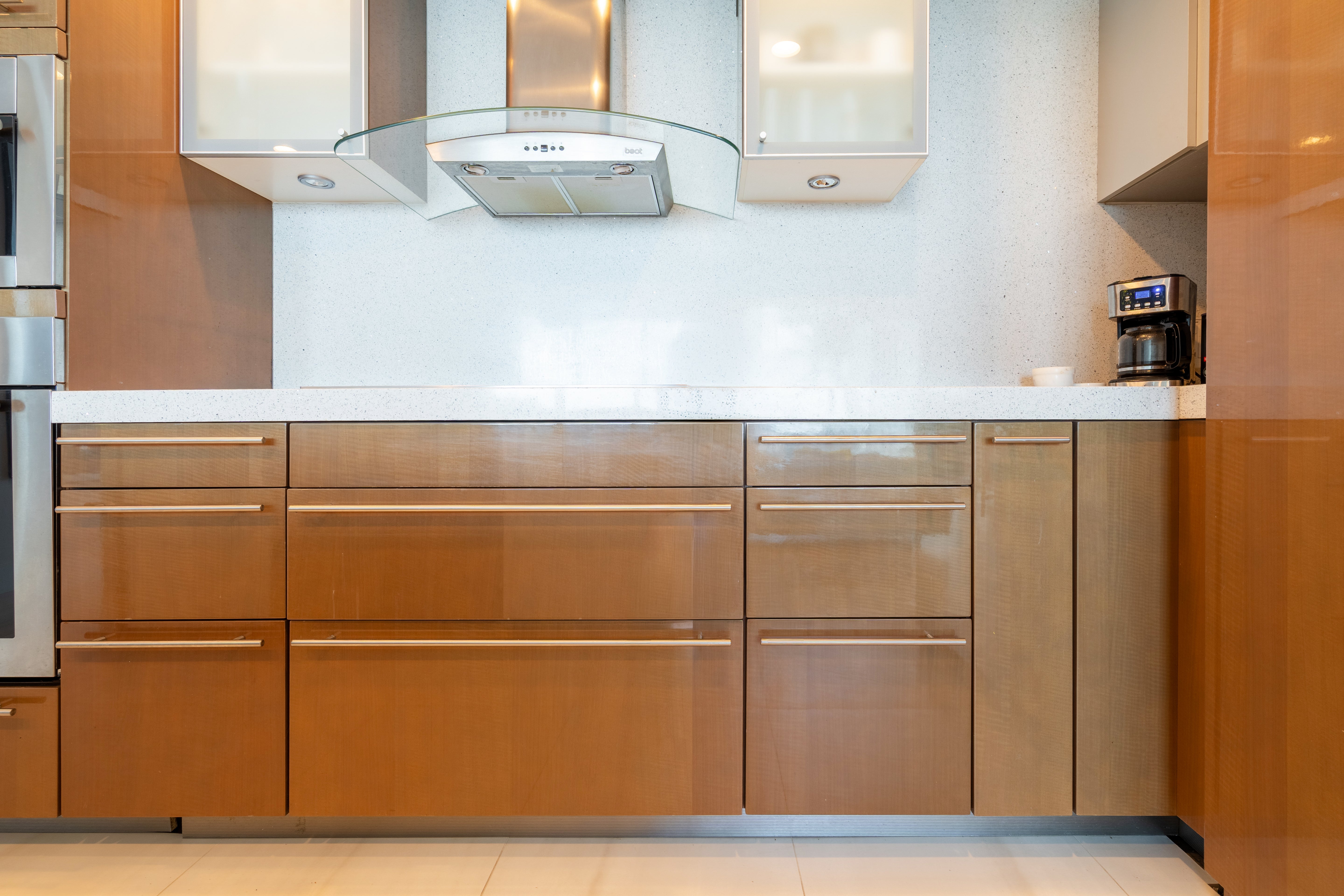 Poggenpohl Modern Glossy Exotic Wood Veneer Kitchen with Island & Miele Appliances