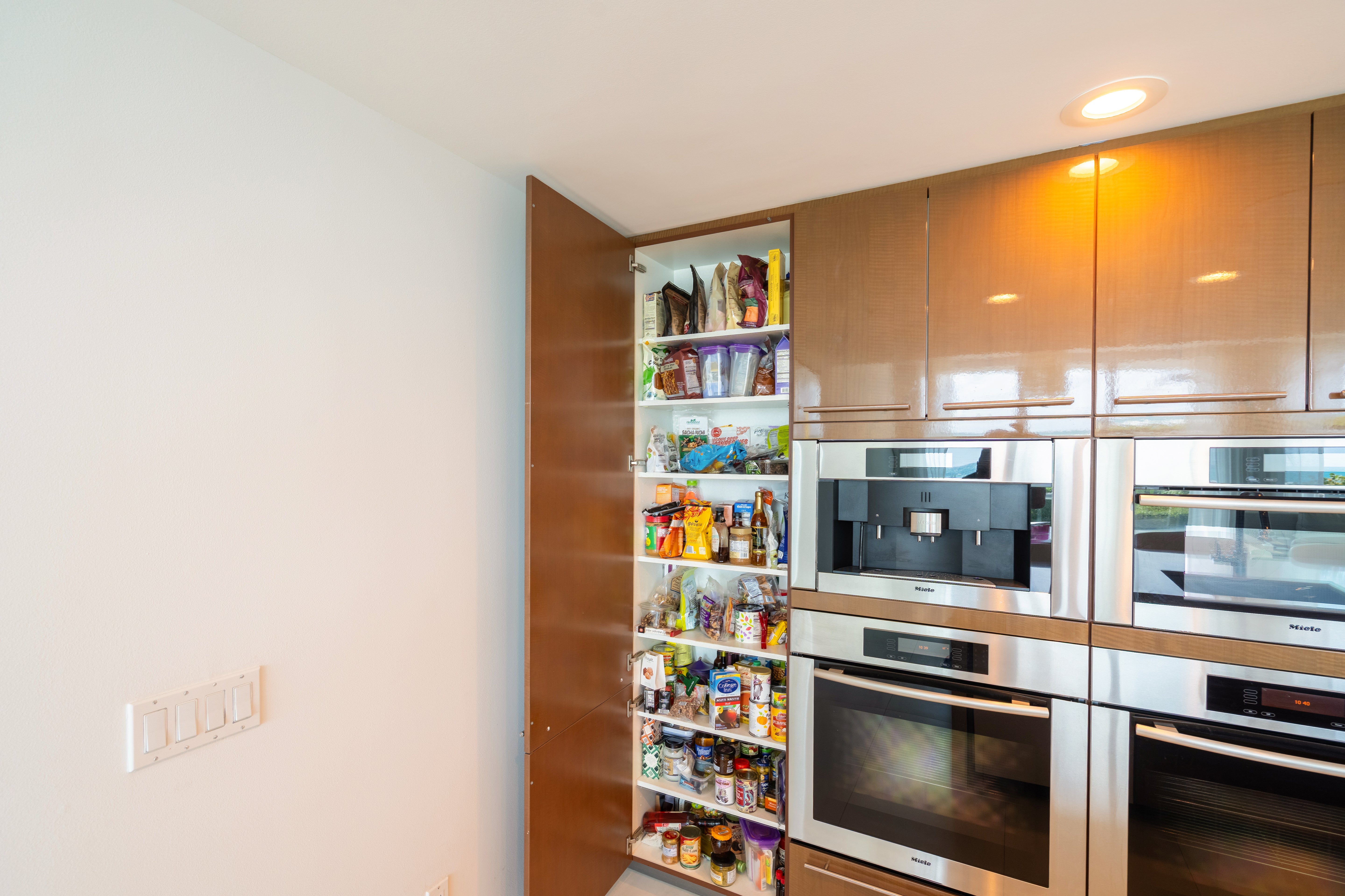 Poggenpohl Modern Glossy Exotic Wood Veneer Kitchen with Island & Miele Appliances