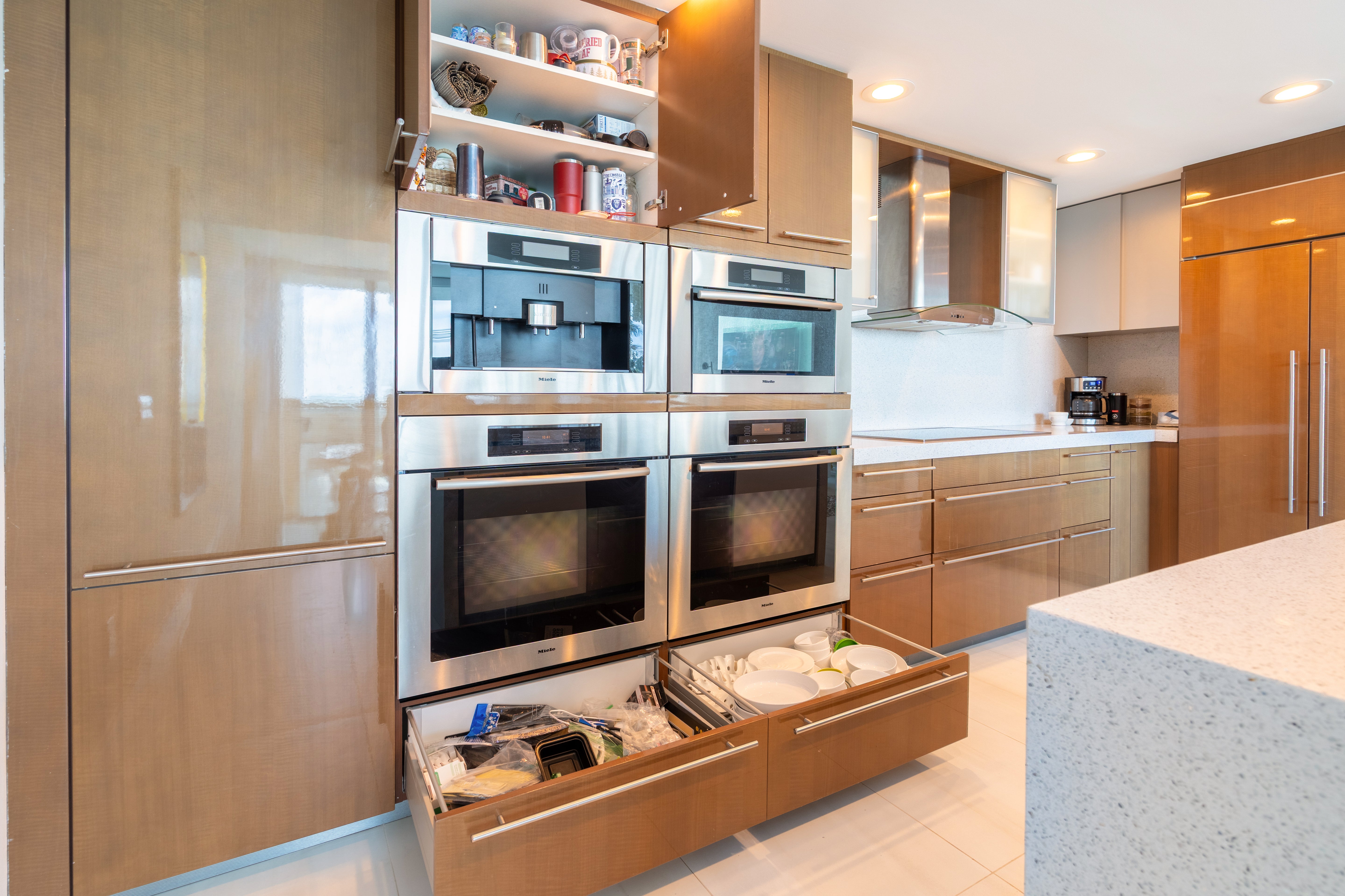 Poggenpohl Modern Glossy Exotic Wood Veneer Kitchen with Island & Miele Appliances