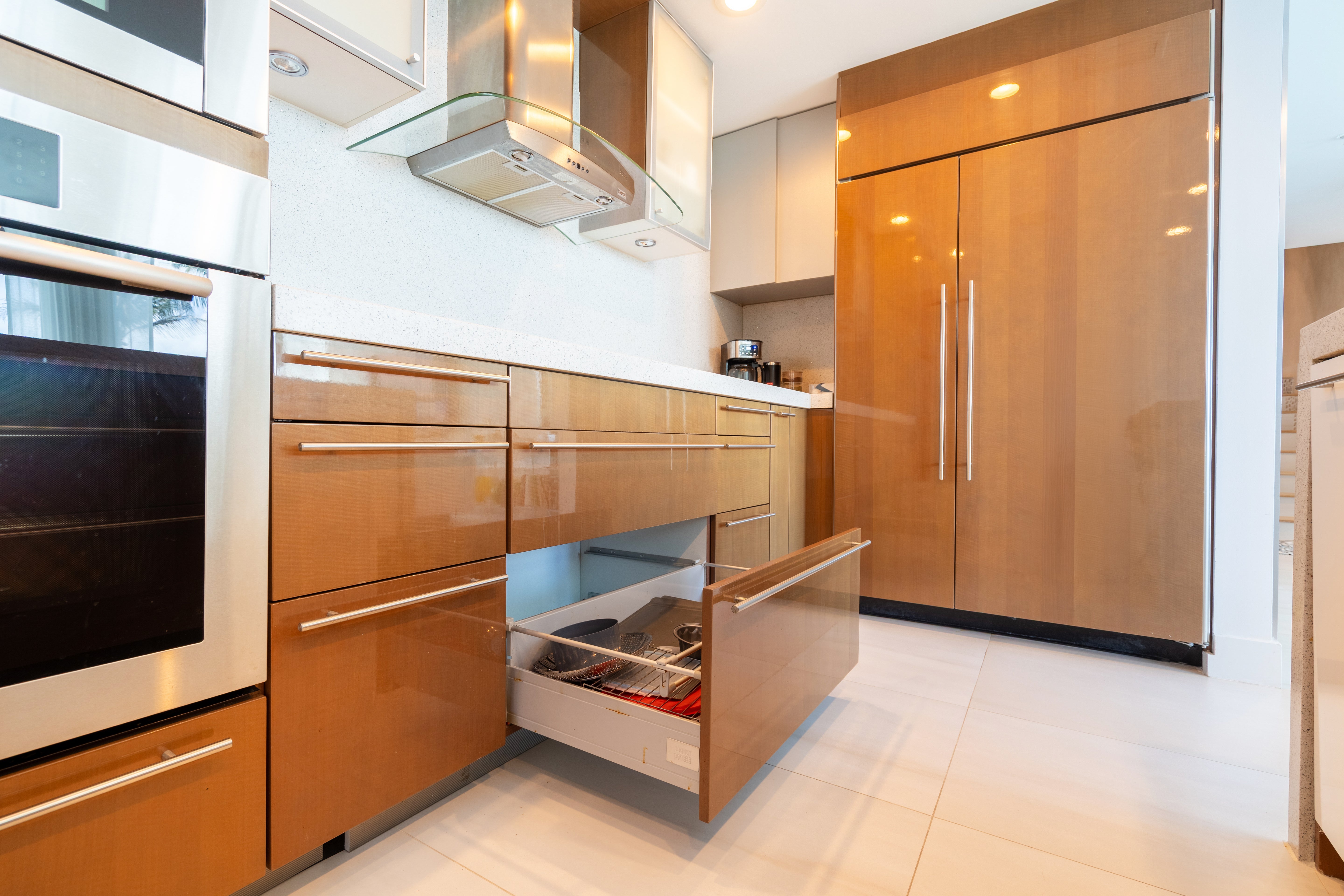 Poggenpohl Modern Glossy Exotic Wood Veneer Kitchen with Island & Miele Appliances
