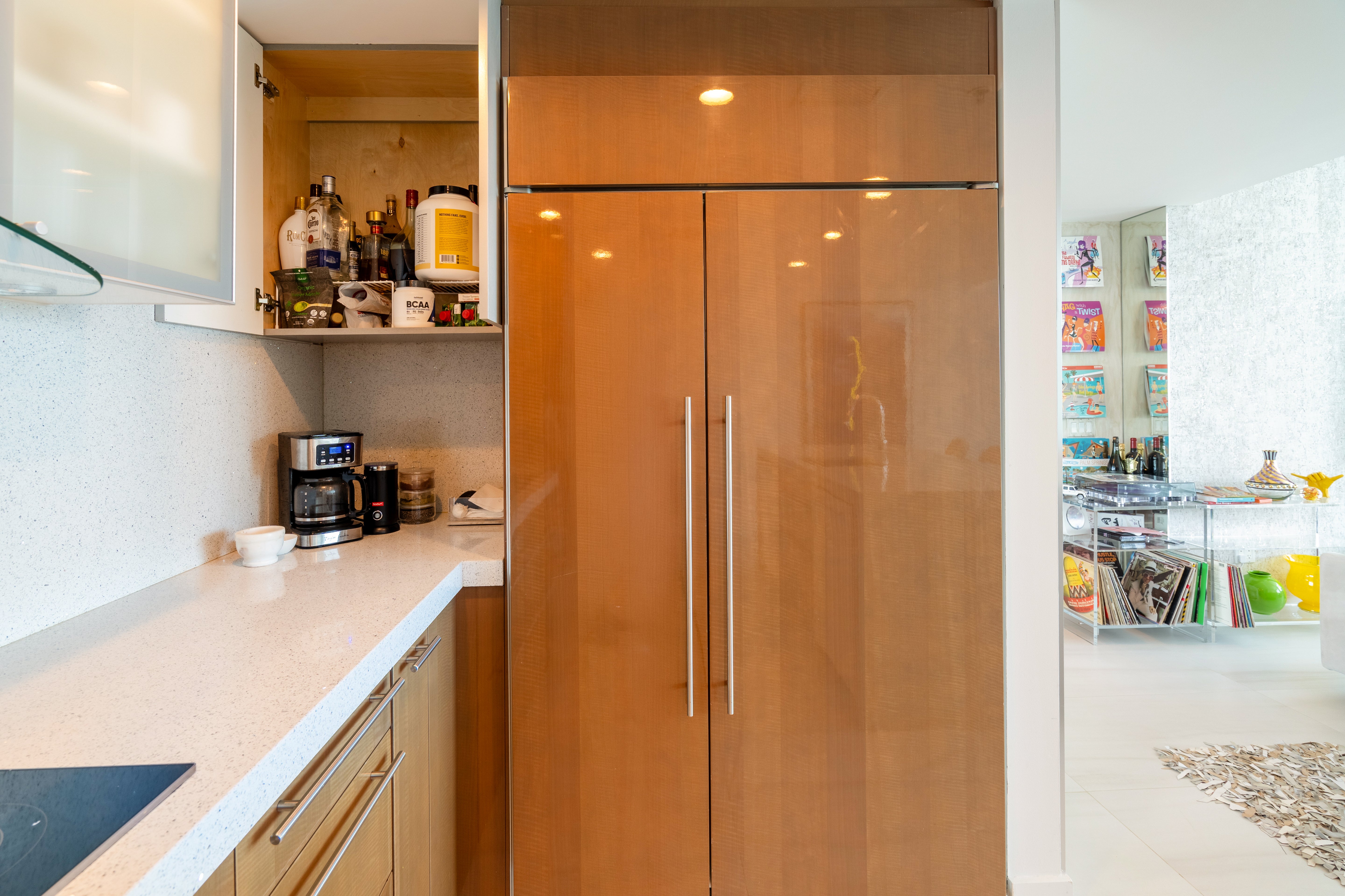 Poggenpohl Modern Glossy Exotic Wood Veneer Kitchen with Island & Miele Appliances