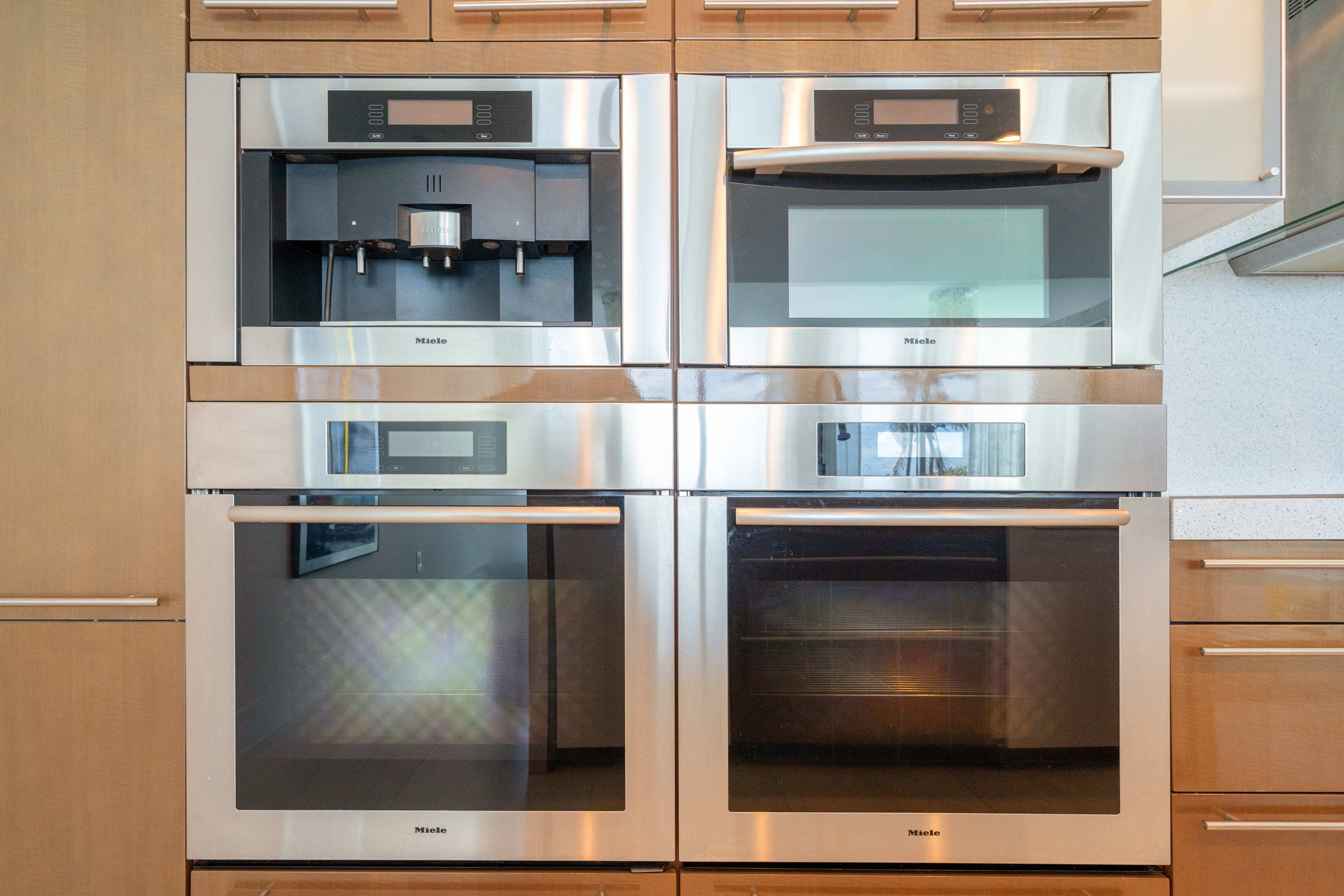 Poggenpohl Modern Glossy Exotic Wood Veneer Kitchen with Island & Miele Appliances