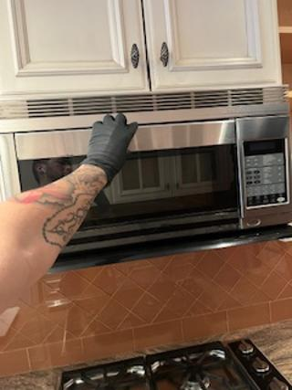 Wood-Mode Wonder: Traditional Light Cream Kitchen with Granite Countertops
