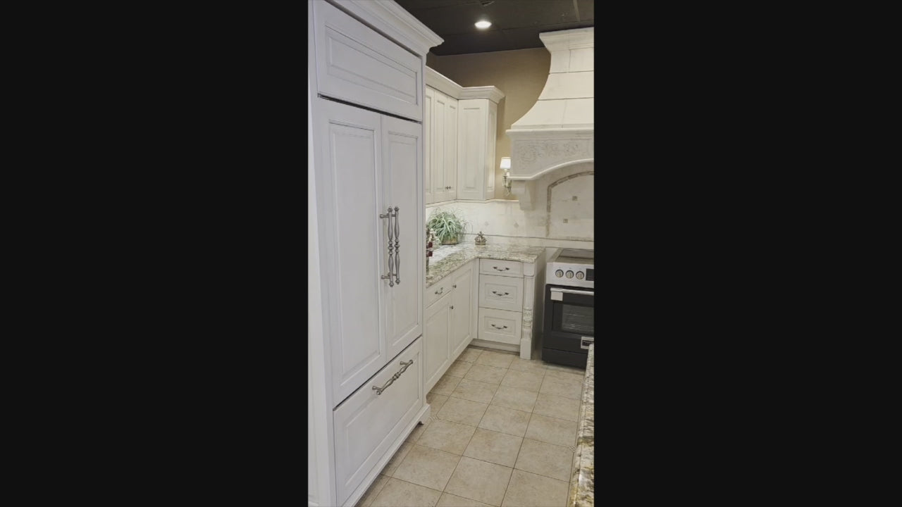 Load video: Signature Custom Traditional White Kitchen with Granite Countertops and Appliances