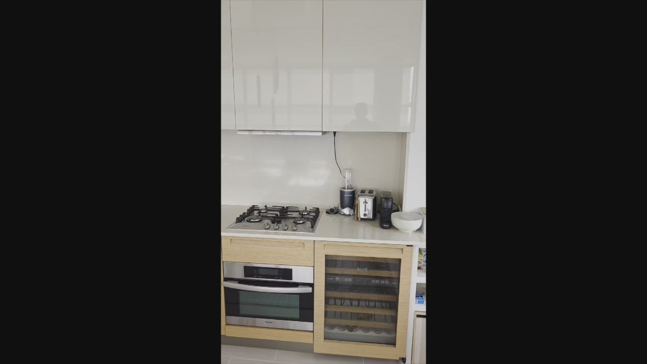 Load video: Luxury Poliform kitchen suite featuring Miele ovens and Sub-Zero refrigerator
