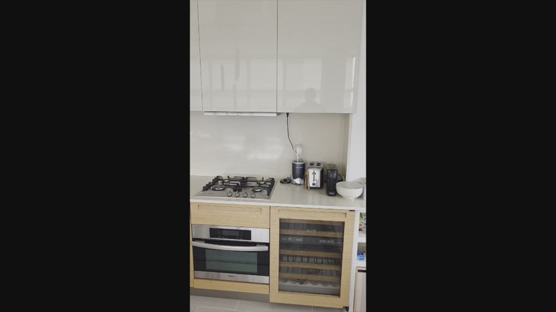 Luxury Poliform kitchen suite featuring Miele ovens and Sub-Zero refrigerator