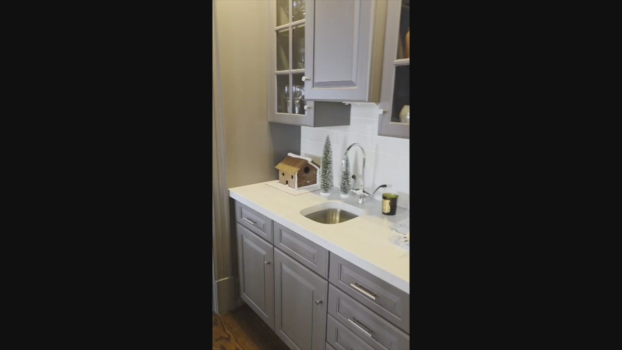Load video: Custom Transitional Dark Grey Butler's Pantry with White Marble Countertops and Sink
