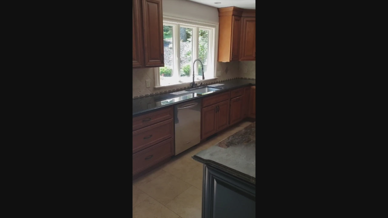 Load video: The Brighton traditional classic natural wood kitchen package with raised panel cabinetry and center island