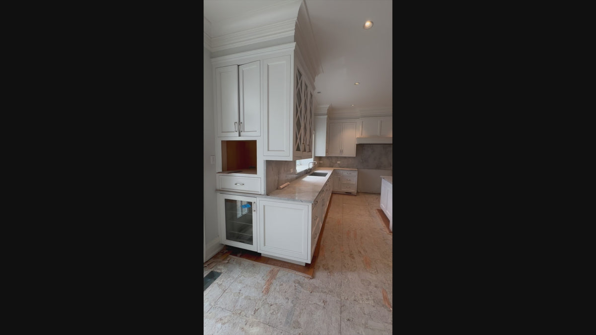 Load video: The Blenheim transitional white kitchen cabinets with island and Sub-Zero refrigerators
