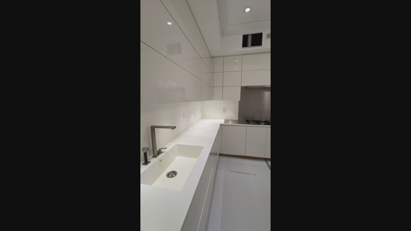 Luxury Italian architectural high gloss white kitchen suite with integrated appliances