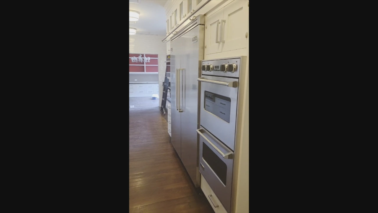 Load video: Premier Custom-Built Transitional White Kitchen with Viking Appliances
