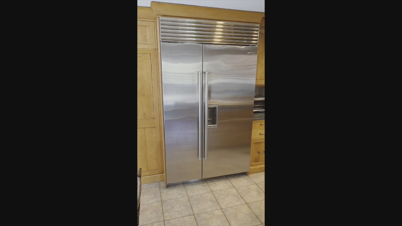 Load video: Custom Transitional Wooden Kitchen with Island, Granite Countertops and 48" Sub-Zero Refrigerator