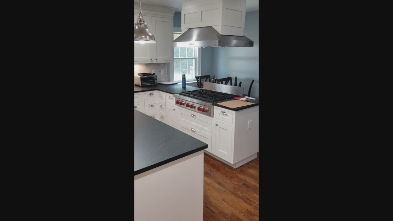 Load video: Custom Traditional White Kitchen with Stone Countertops and Appliances
